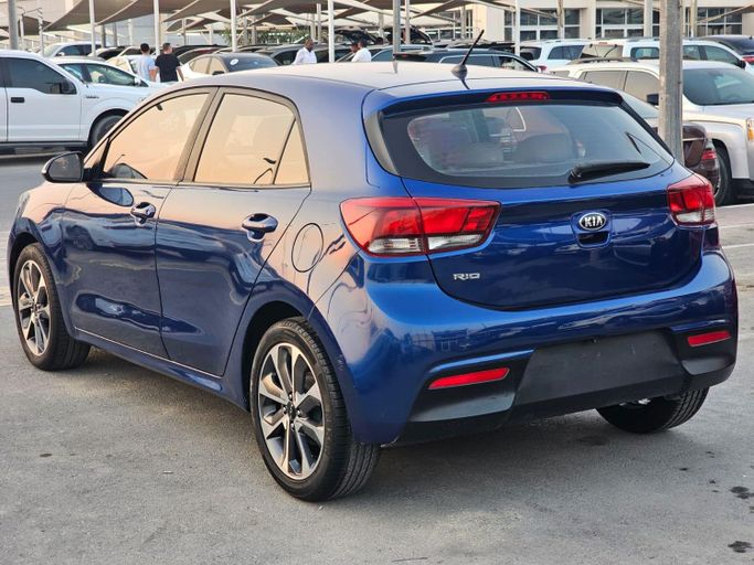 Used Kia Rio IV (Global market), 1.4 l, 2019 in Sharjah by Al Helal Al Abyadh Used Cars, Blue color. GCC Specs | AUTO.AE