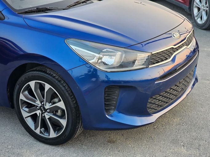 Used Kia Rio IV (Global market), 1.4 l, 2019 in Sharjah by Al Helal Al Abyadh Used Cars, Blue color. GCC Specs | AUTO.AE