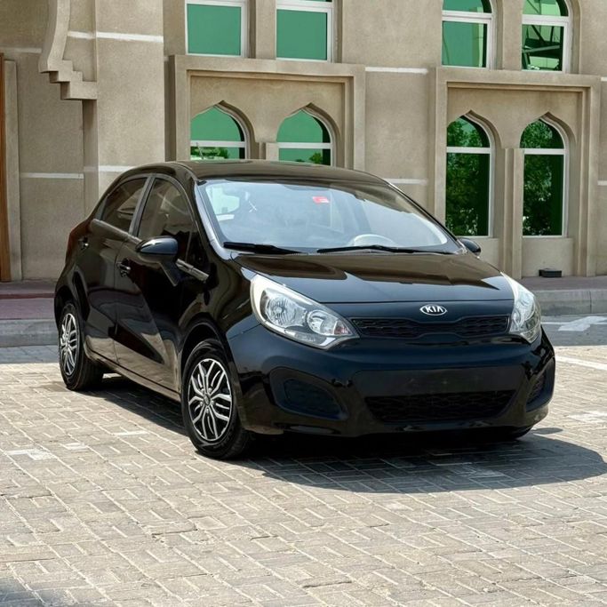 Подержанный Kia Rio III, 1.6 л, 2014 в Шардже от Sarmad Cars Черный цвет. Other | AUTO.AE