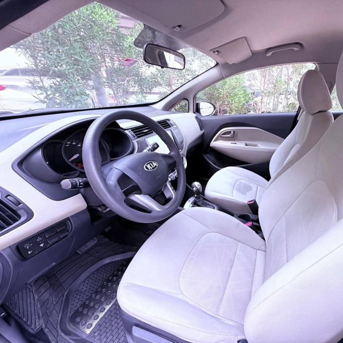 Подержанный Kia Rio III, 1.6 л, 2014 в Шардже от Sarmad Cars Черный цвет. Other | AUTO.AE