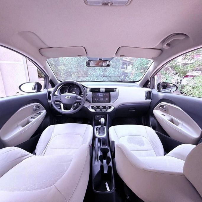 Подержанный Kia Rio III, 1.6 л, 2014 в Шардже от Sarmad Cars Черный цвет. Other | AUTO.AE