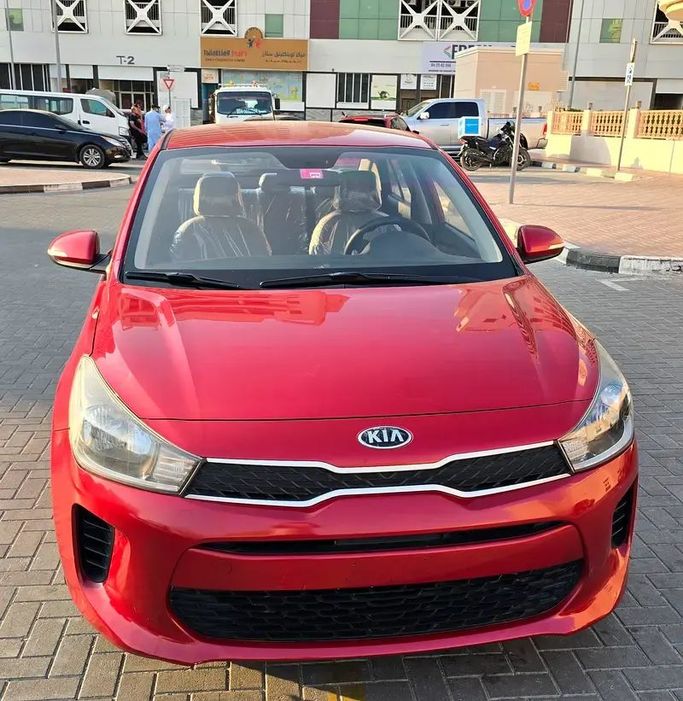 Used Kia Rio IV, 1.6 l, 2018 in Sharjah by Ardh Al Ahlam Used Cars, Red color. GCC Specs | AUTO.AE