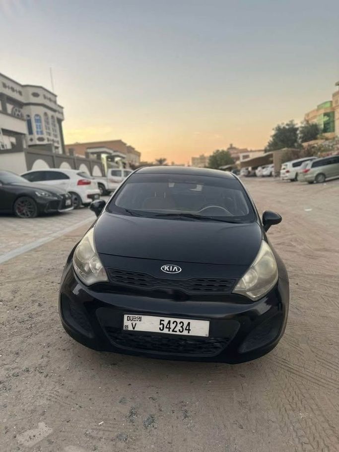 Used Kia Rio III, 1.4 l, 2015 in Sharjah by Al Ashiqa Used Cars, Black color.  | AUTO.AE