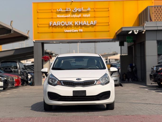Подержанный Kia Rio III, 1.4 л, 2014 в Шардже от FAROUK KHALAF Белый цвет. GCC | AUTO.AE | Объявление #271779
