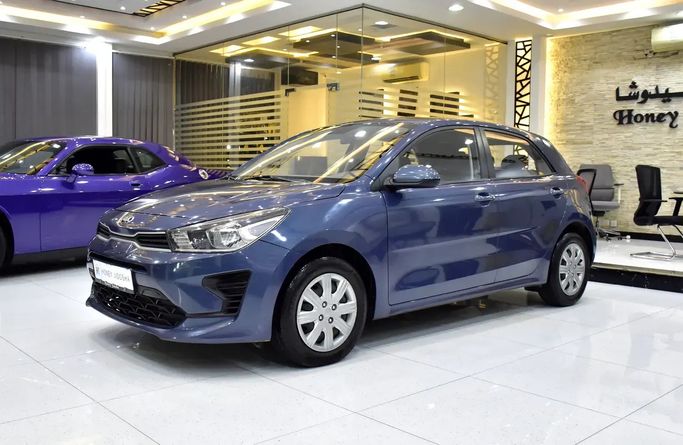 Подержанный Kia Rio IV Рестайлинг (SC), 1.4 л, 2021 в Шардже от Honey Jidosha Used Cars Tr. Тёмно-синий цвет. GCC | AUTO.AE | Объявление #273366