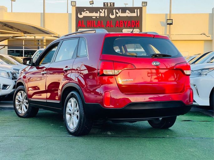 Used Kia Sorento II Facelift, 3.3 l, 2015 in Sharjah by Al Helal Al Abyadh Used Cars, Red color. GCC Specs | AUTO.AE