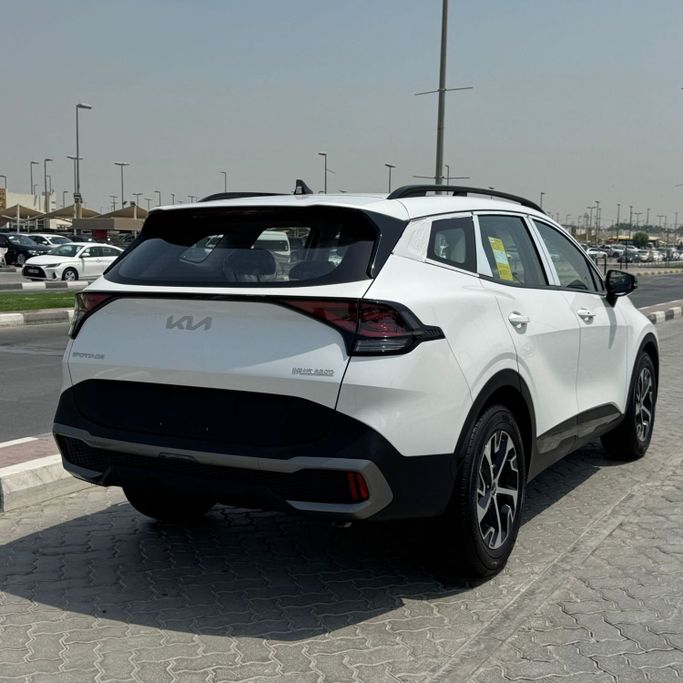 New Kia Sportage V, 1.5 l, 2024 in Sharjah by Alfaris Used Cars, White color.  | AUTO.AE
