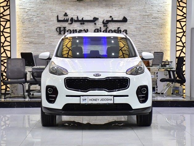 Подержанный Kia Sportage IV, 2.4 л, 2017 в Шардже от Honey Gidosha Used Cars Tr. Белый цвет.  | AUTO.AE