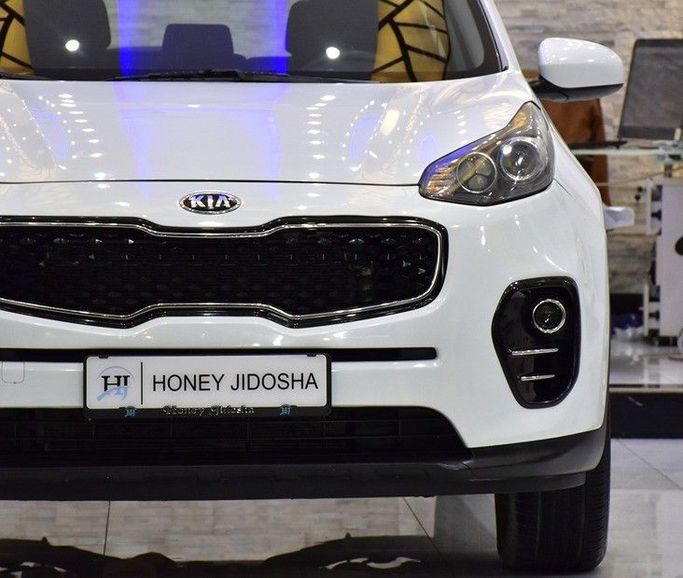 Подержанный Kia Sportage IV, 2.4 л, 2017 в Шардже от Honey Gidosha Used Cars Tr. Белый цвет.  | AUTO.AE