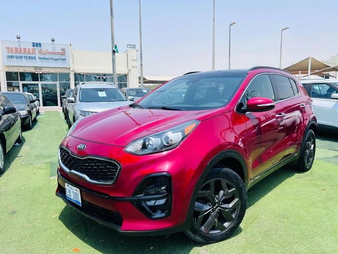 Подержанный Kia Sportage IV Рестайлинг, 2.4 л, 2020 в Шардже от Tabarak Used Cars Красный цвет. Американская | AUTO.AE