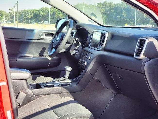 Used Kia Sportage IV Facelift, 2.0 l, 2021 in Sharjah by Nassem Al Sham Used Cars, Red color. American Specs | AUTO.AE