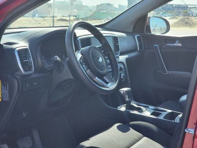 Used Kia Sportage IV Facelift, 2.0 l, 2021 in Sharjah by Nassem Al Sham Used Cars, Red color. American Specs | AUTO.AE