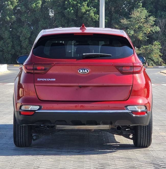 Used Kia Sportage IV Facelift, 2.0 l, 2021 in Sharjah by Nassem Al Sham Used Cars, Red color. American Specs | AUTO.AE