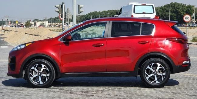 Used Kia Sportage IV Facelift, 2.0 l, 2021 in Sharjah by Nassem Al Sham Used Cars, Red color. American Specs | AUTO.AE
