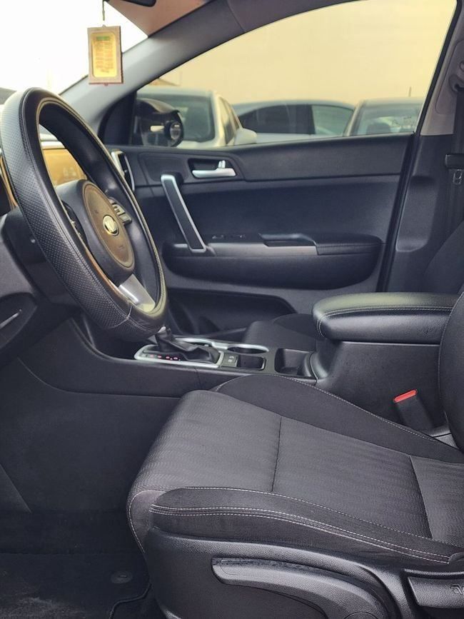 Used Kia Sportage IV Facelift, 2.4 l, 2021 in Sharjah by Nassem Al Sham Used Cars, Black color. American Specs | AUTO.AE