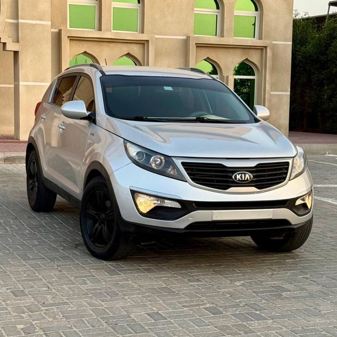 Used Kia Sportage III, 2.0 l, 2014 in Sharjah by Sarmad Cars, Silver color. Other | AUTO.AE