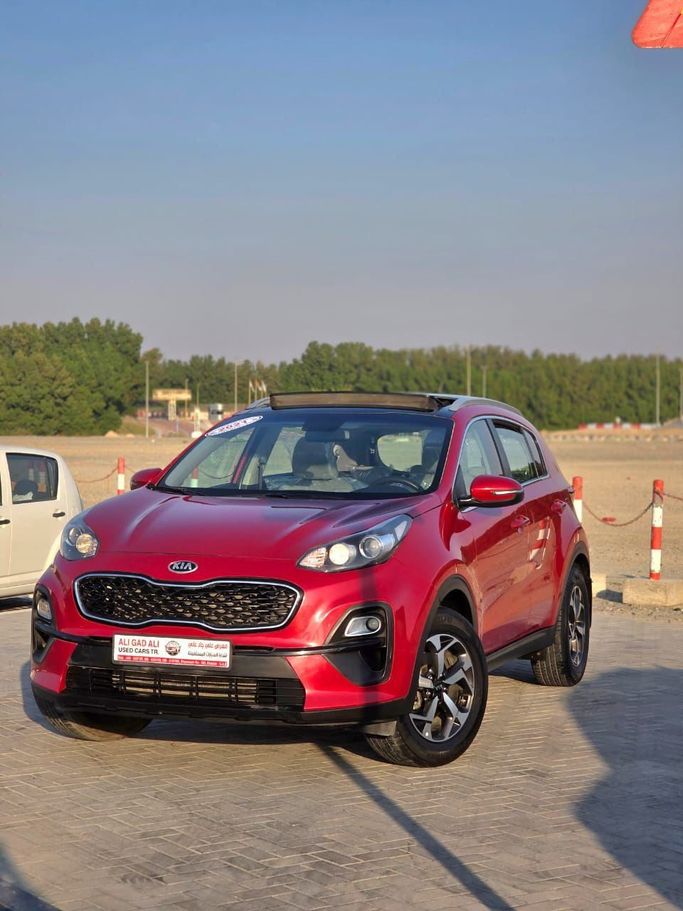 Used Kia Sportage IV Facelift, 2.0 l, 2021 in Sharjah by Mohamed Zaki Younis Used Cars, Red color. Other | AUTO.AE