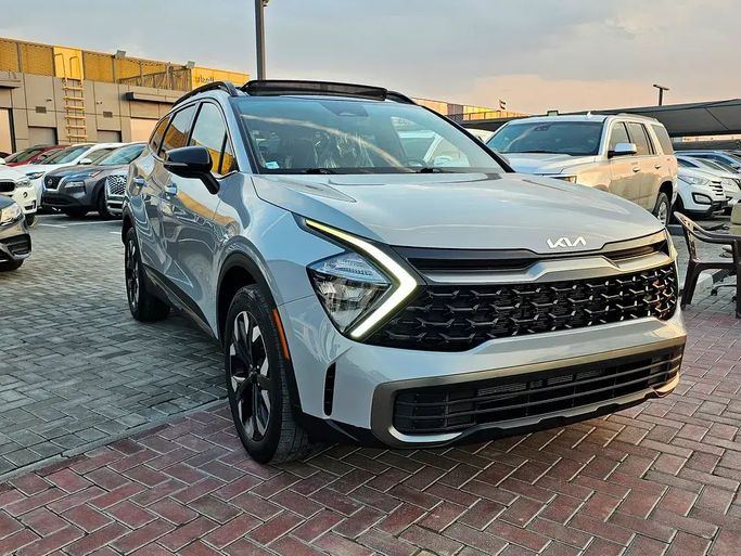 Used Kia Sportage V, 2.5 l, 2023 in Sharjah by Al Hedou Used Cars, Grey color. American Specs | AUTO.AE
