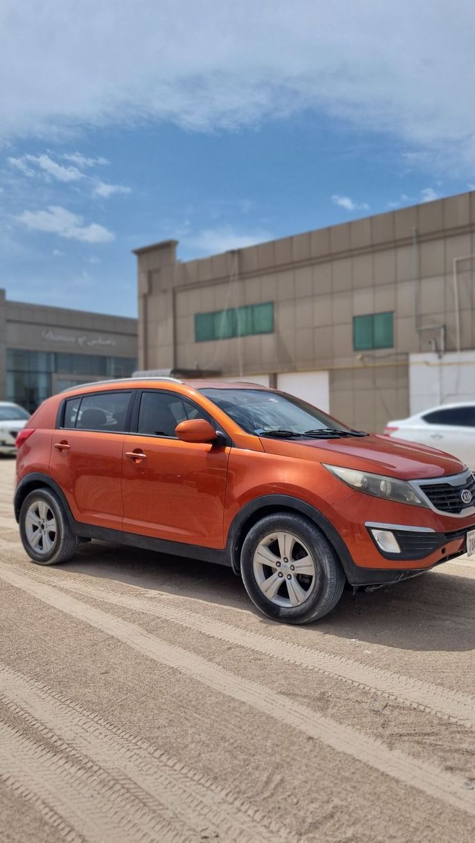 Used Kia Sportage III, 2.4 l, 2012 in Sharjah, Orange color. Korean Specs | AUTO.AE
