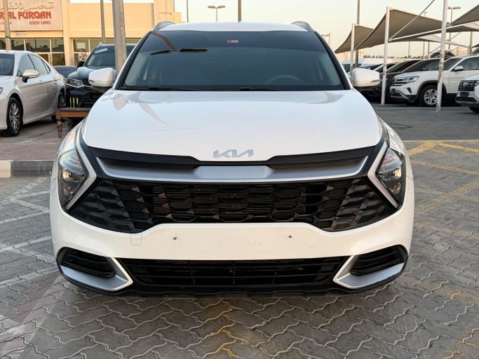 Used Kia Sportage V, 2.0 l, 2023 in Sharjah by Ahmad Car Dealer, White color. GCC Specs | AUTO.AE