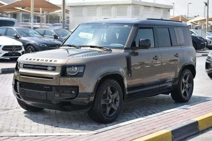 New Land Rover Defender 110 II, 2.0 l, 2023 in Sharjah by Alfaris Used Cars, Brown color. Other | AUTO.AE