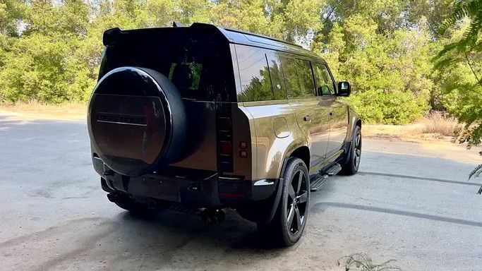 Used Land Rover Defender 110 II, 3.0 l, 2024 in Sharjah by Ali Abood Used Cars, Brown color. GCC Specs | AUTO.AE