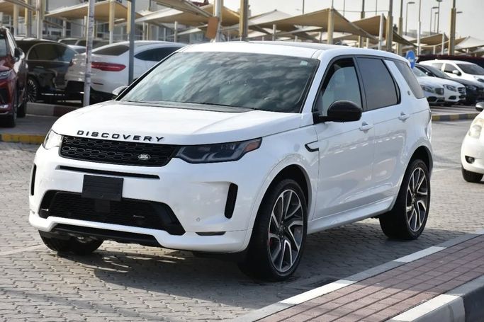 Подержанный Land Rover Discovery Sport I Рестайлинг, 2.0 л, 2023 в Шардже от Alfaris Used Cars Белый цвет. Other | AUTO.AE