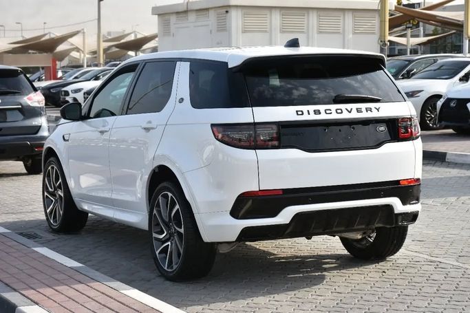 Подержанный Land Rover Discovery Sport I Рестайлинг, 2.0 л, 2023 в Шардже от Alfaris Used Cars Белый цвет. Other | AUTO.AE