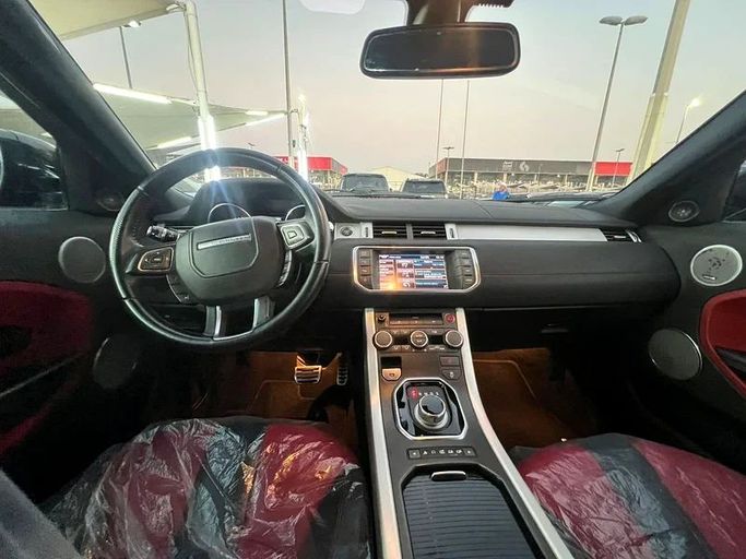 Used Land Rover Range Rover Evoque P285 I, 2.0 l, 2013 in Sharjah by Al Haram Al Masy, Red color. GCC Specs | AUTO.AE