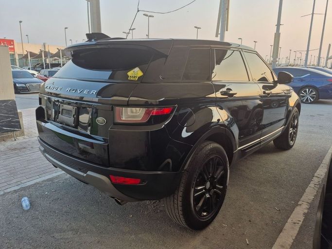Подержанный Land Rover Range Rover Evoque P300 II, 2.0 л, 2019 в Шардже от Al Sada used cars Черный цвет. Американская | AUTO.AE