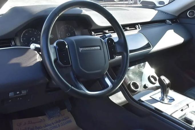Used Land Rover Range Rover Evoque P250 II, 2.0 l, 2020 in Sharjah by Alfaris Used Cars, White color. Other | AUTO.AE