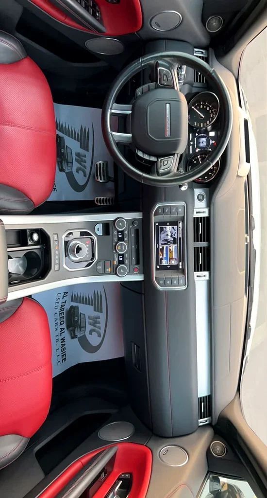 Подержанный Land Rover Range Rover Evoque P240 I Рестайлинг, 2.0 л, 2016 в Шардже от Karkuk Used Cars Белый цвет. Канадская | AUTO.AE