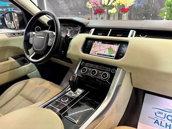 Подержанный Land Rover Range Rover Sport P510e II, 5.0 л, 2015 в Шардже от Ayoon Alhoot Motors Белый цвет. GCC | AUTO.AE