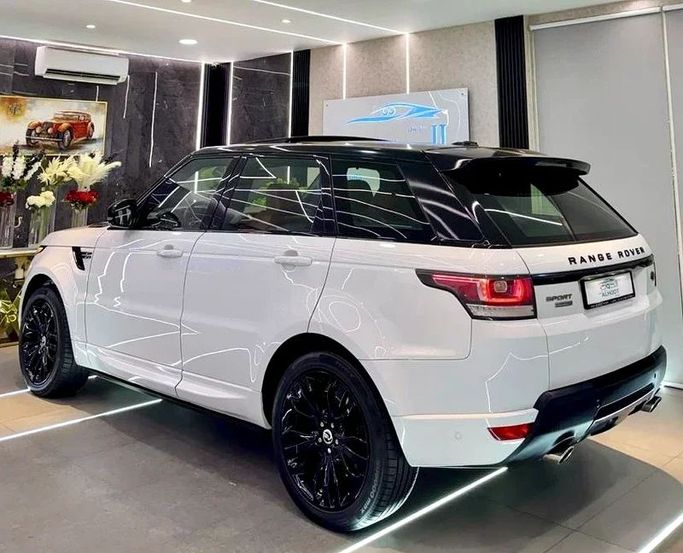 Used Land Rover Range Rover Sport P510e II, 5.0 l, 2016 in Sharjah by Ayoon Alhoot Motors, White color. GCC Specs | AUTO.AE