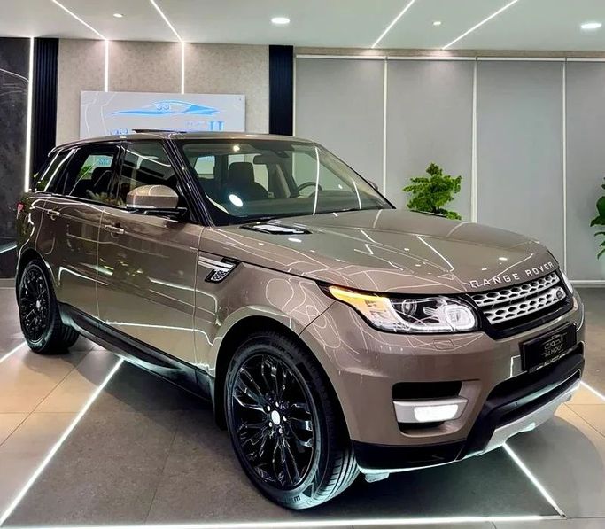 Used Land Rover Range Rover Sport P510e II, 5.0 l, 2016 in Sharjah by Ayoon Alhoot Motors, Brown color. GCC Specs | AUTO.AE