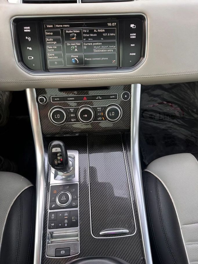 Подержанный Land Rover Range Rover Sport P550e II, 5.0 л, 2015 в Шардже от Al Sada used cars Белый цвет. GCC | AUTO.AE