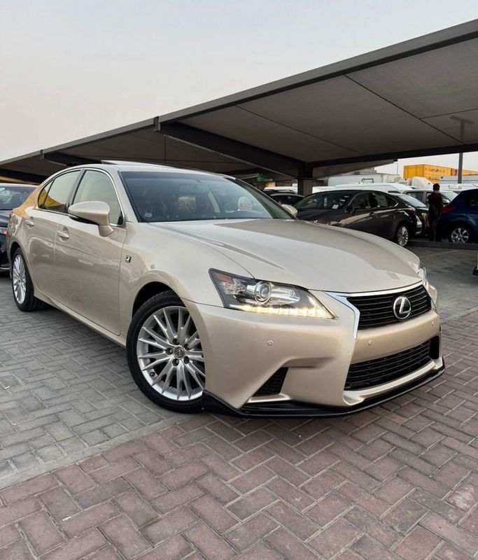 Подержанный Lexus GS 350 IV, 3.5 л, 2013 в Шардже от Al Tasamuh Used Cars Золотистый цвет.  | AUTO.AE