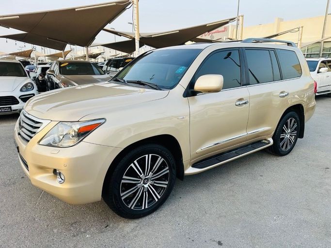Used Lexus LX 570 III, 5.7 l, 2010 in Sharjah by Titanium Used Cars, Golden color. GCC Specs | AUTO.AE