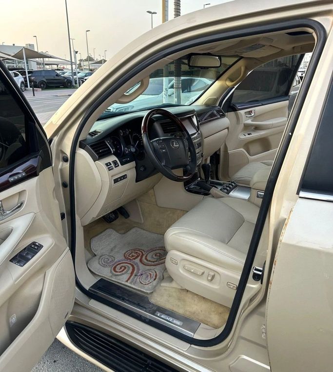 Used Lexus LX 570 III, 5.7 l, 2010 in Sharjah by Titanium Used Cars, Golden color. GCC Specs | AUTO.AE