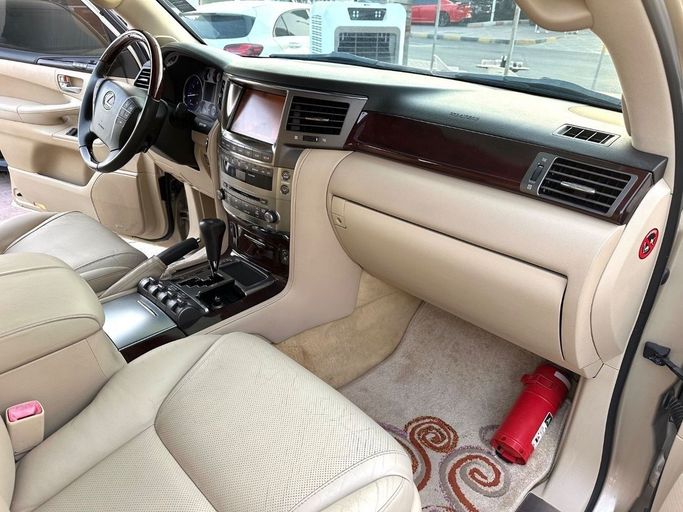 Used Lexus LX 570 III, 5.7 l, 2010 in Sharjah by Titanium Used Cars, Golden color. GCC Specs | AUTO.AE