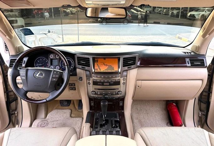 Used Lexus LX 570 III, 5.7 l, 2010 in Sharjah by Titanium Used Cars, Golden color. GCC Specs | AUTO.AE