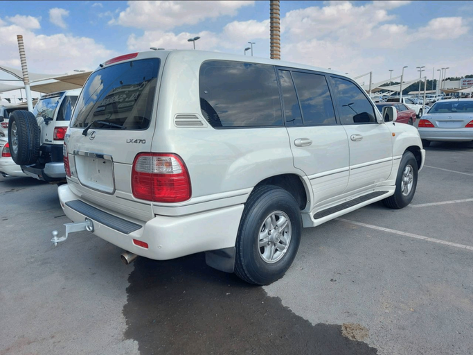 Used Lexus LX 470 II, 4.7 l, 2001 in Sharjah by Alsabah Used Cars, White color. Japanese Specs | AUTO.AE
