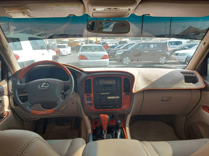 Used Lexus LX 470 II, 4.7 l, 2001 in Sharjah by Alsabah Used Cars, White color. Japanese Specs | AUTO.AE