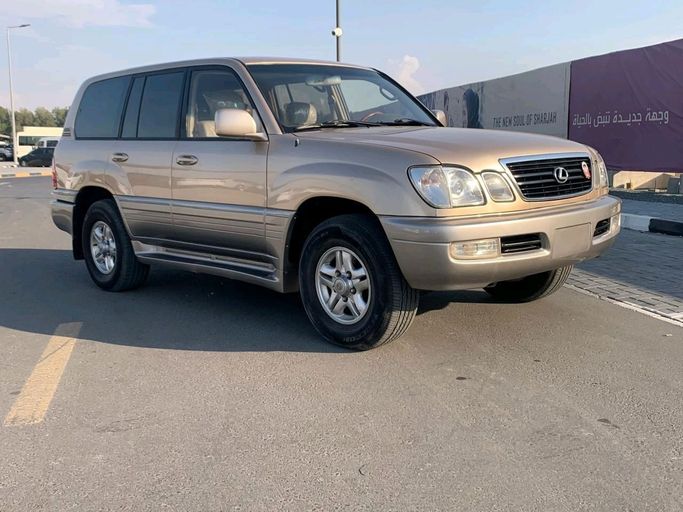 Подержанный Lexus LX 470 II, 4.7 л, 2001 в Шардже от Al Najem Used Cars Золотистый цвет. Американская | AUTO.AE