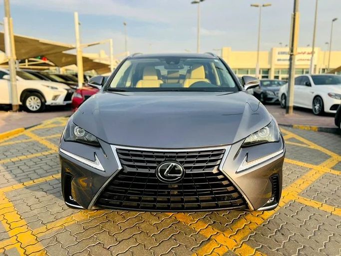 Подержанный Lexus NX 300 I Рестайлинг, 2.0 л, 2021 в Шардже от Karkuk Used Cars Серый цвет. Американская | AUTO.AE