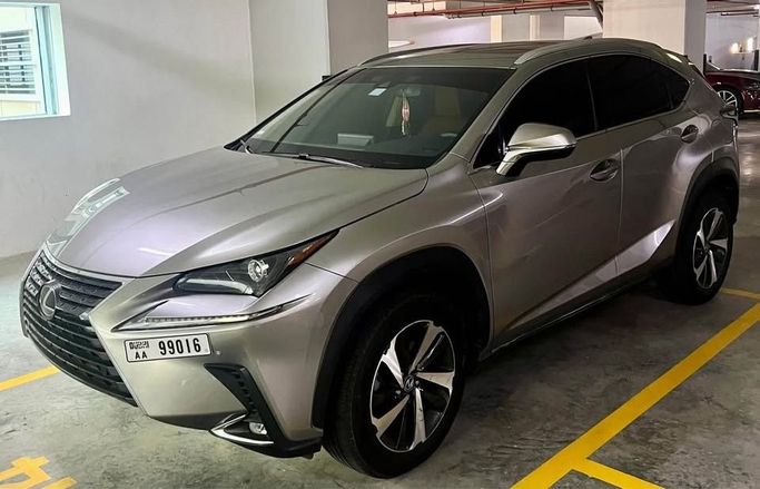 Used Lexus NX 300 I Facelift, 2.0 l, 2019 in Sharjah by Al Ashiqa Used Cars, Silver color. American Specs | AUTO.AE