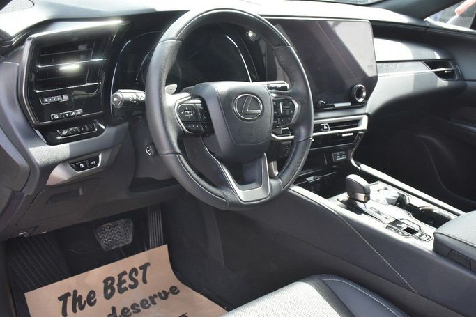 Подержанный Lexus RX 350 V, 2.4 л, 2023 в Шардже от Alfaris Used Cars Коричневый цвет.  | AUTO.AE