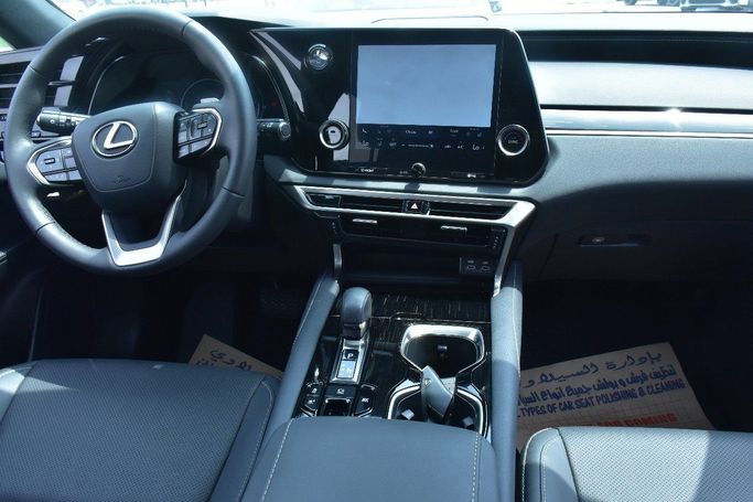 Подержанный Lexus RX 500h V, 2.4 л, 2024 в Шардже от Alfaris Used Cars Серый цвет.  | AUTO.AE