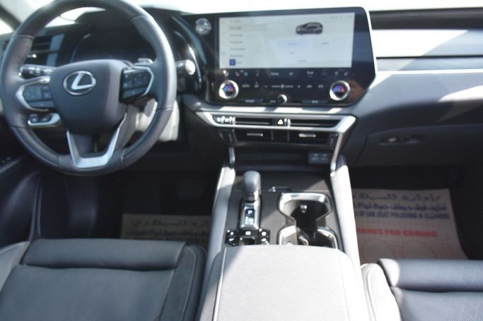 Подержанный Lexus RX 350 V, 2.4 л, 2024 в Шардже от Alfaris Used Cars Коричневый цвет.  | AUTO.AE