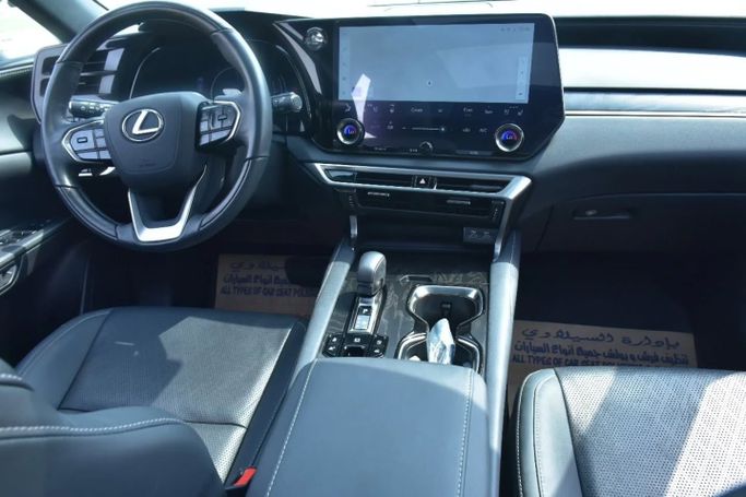 Подержанный Lexus RX 350 V, 2.4 л, 2023 в Шардже от Alfaris Used Cars Бронзовый цвет. Other | AUTO.AE